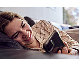   Teenager, Smiling, Sofa, Relaxed, Smart Phone